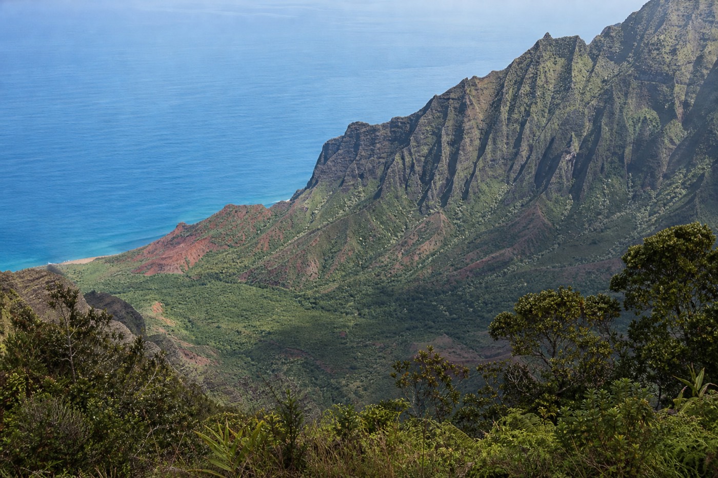 View down Kalalau Valley to the Nā Pali Coast and ocean from Kalalau Lookout on Kauai