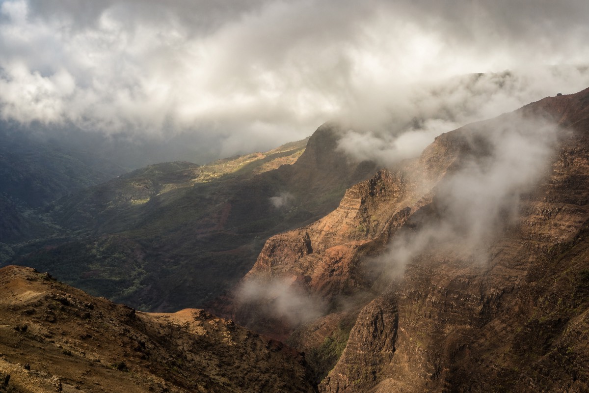 Clouds building over the canyon rim by afternoon